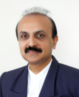 Dr. Radhesh S
